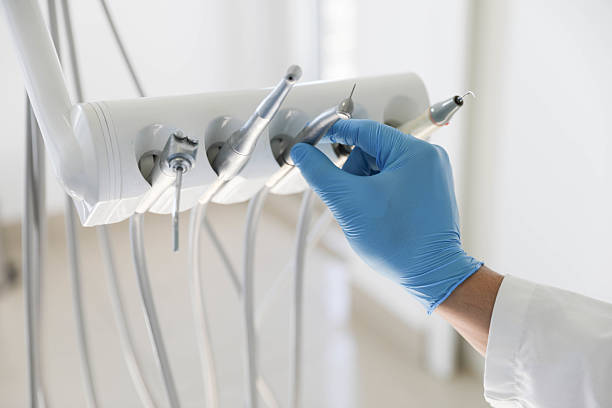 Professional Tooth Extraction technician working in Maurice, LA